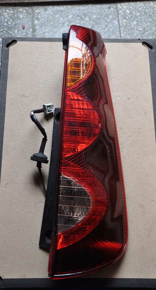 NISSAN NOTE LIFT 09-12 PRAWA CIEMNA ORYGINAŁ