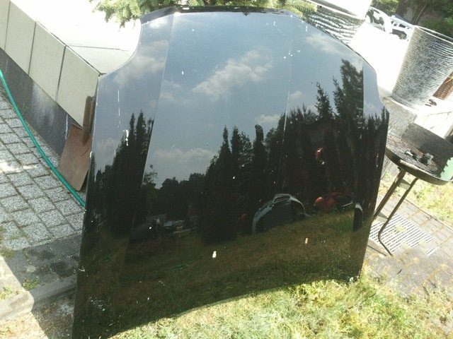 Cadillac SRX капот кришка двигуна