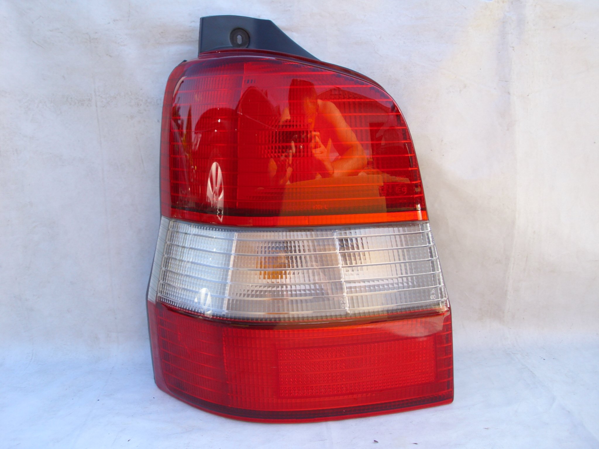Lampa tylna tył lewa Mazda Demio 9699r EUROPA