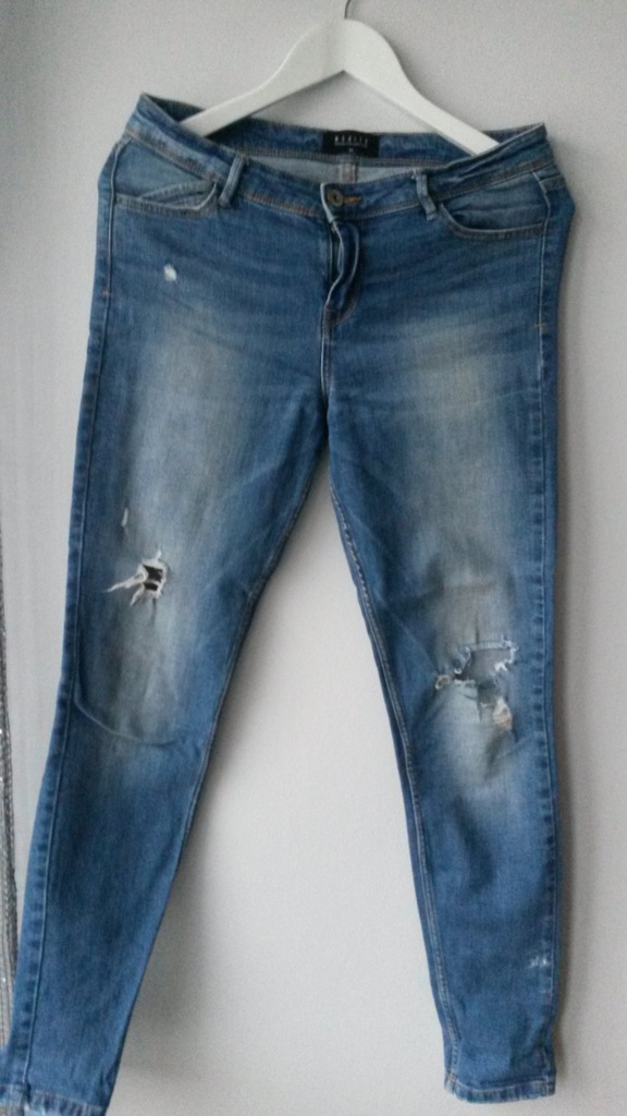 Spodnie jeansy Mohito 38