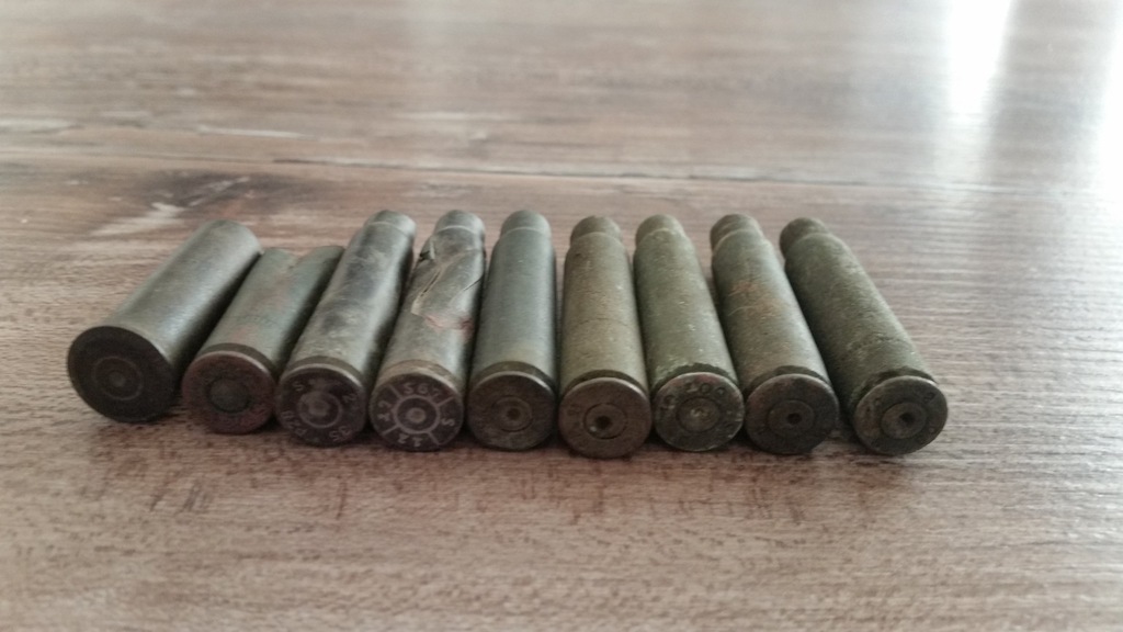 Militaria wykopki łuski łuska 9 szt. sygnowane
