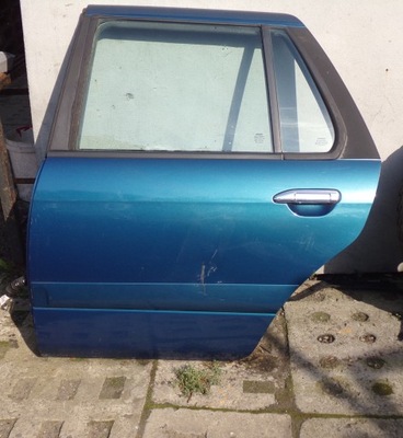 Nissan primera p11 lift kombi двері лівий задня фото №1