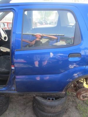 Двері ліва задня ignis 04-08 повний zcg фото №1