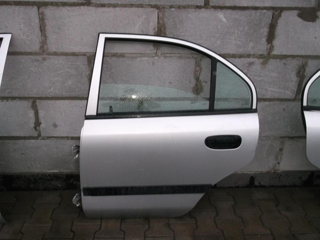 фото №1, Двері ліва задня mitsubishi carisma 2 a50 -доставка-