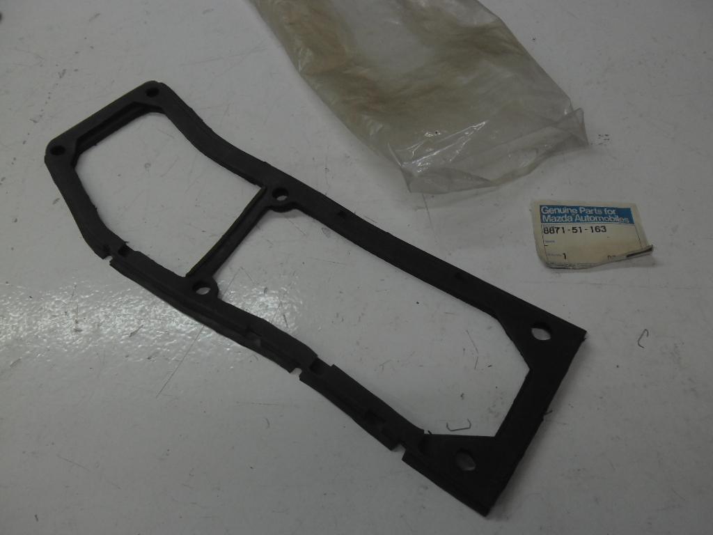 фото №2, Прокладка лампи задня mazda rx7 nowa оригінал