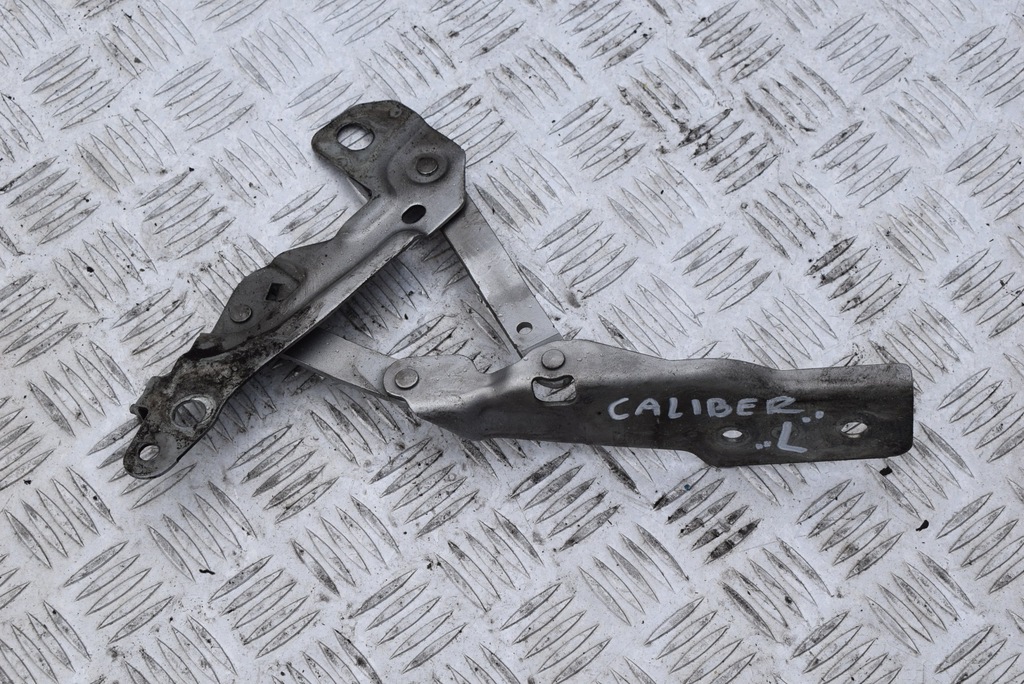 фото №1, Петля капот левый dodge caliber